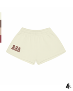 Alpha Xi Delta Cheetah Ivory Shorts Front