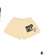 Sigma Delta Tau Free Spirit Light Yellow Shorts by Alpha Apparel Co. – front view
